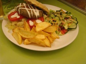 Tofu burger with fresh veggies and fresh salad at Peas and Love in Budapest