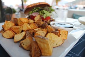 delicious vegan burger with baked potato wedges at Carena Bar-Restaurant in Kefalonia