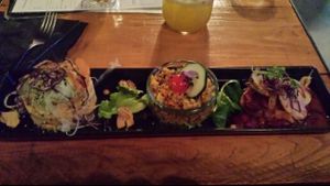 Combovegan: un tris di antipasti stuzzicanti. Particolare l'hummus di ceci. at Soda in Alba