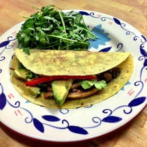 Tortilla with seiten, peppers, onions, chilli, avocado and brown rice at Yuli's Lunch Box in Haifa