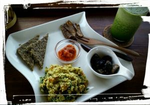 Classic breakfast - scrambled 'eggs', aubergine bacon, raw bread, marinates mushrooms, salsa. at The Seeds of Life in Ubud