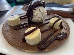 Banana and activated walnut pancakes. Not of the soft and fluffy variety but really yummy and light   at The Seeds of Life in Ubud