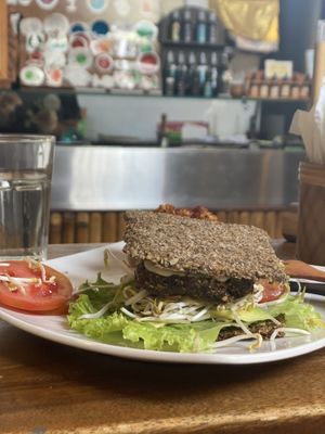 Pesto burger with onion bread  at The Seeds of Life in Ubud