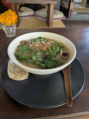 Warmed Soup of the Tao with slice of bread at The Seeds of Life in Ubud