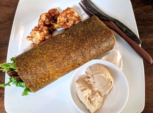 ";Egg and bacon"; burrito with buffalo wings. Amazing. at The Seeds of Life in Ubud