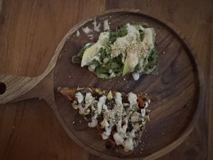 Two cheeky slices of pizza  at The Seeds of Life in Ubud