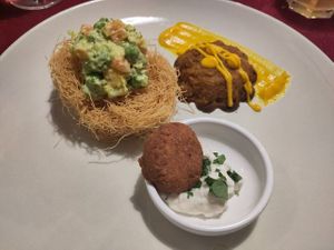 Falafel in salsa tzaziki, nido di pasta fritta, tortino di tompinambur at La Locanda Del Gusto in Vicenza