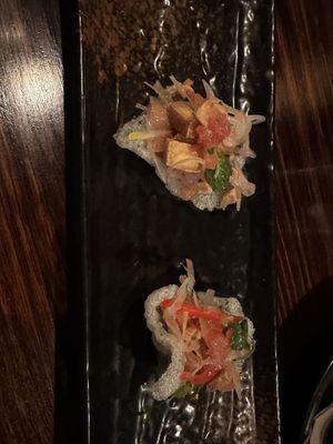 Tofu seasame crackers topped with finger lime   at Lost in Asia in Hobart