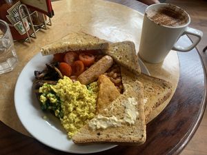 Hearty vegan breakfast and oat milk chai latte  at Cherry Reds Cafe and Bar in Birmingham