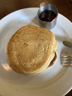 Stack of 3 pancakes with maple sirup   at Cherry Reds Cafe and Bar in Birmingham
