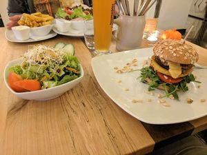 Italian burger and salad at Bunte Burger Cologne in Cologne