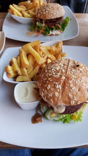 Burger with fries and mayo at Bunte Burger Cologne in Cologne