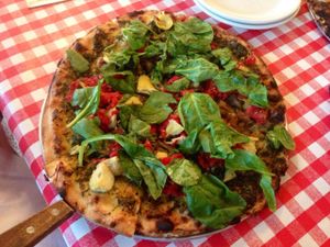 Our vegan pizza! The Daiya cheese is hiding under all the veggies on top. at Sylvia's Brick Oven in Lafayette