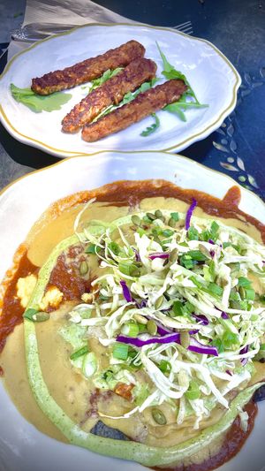 the Chilaquiles with a side of tempeh bacon  at Kitchen Mouse in Los Angeles