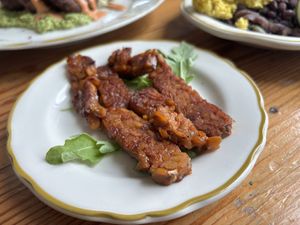 Maple tempeh bacon   at Kitchen Mouse in Los Angeles