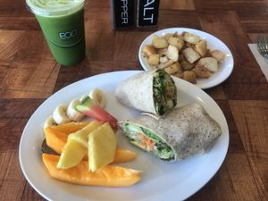 Custom juice, home potatoes, breakfast wrap at Under the Bodhi Tree in Pahoa
