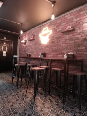 Seating area in front of door at Tuco's Taqueria  in Castlebar