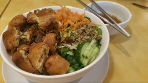 Noodle Salad with shredded salad and spring rolls  at Quan Long Hoa in Westminster