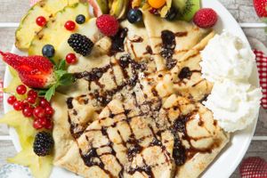 A sweet pancake ( unfortunately not vegan) with lots of fresh fruit. at Nostalgia in Dolny Kubin