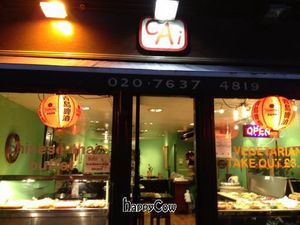 CAI buffet storefront window at CAI Cafe in London