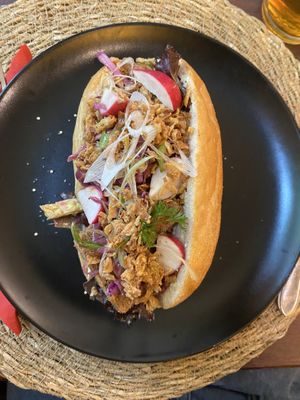 brood met gemarineerde gebakken tofu en koolsla  at Café Gilde in Amsterdam