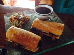 French Dip Sandwich made with portabelo mushrooms, grilled onions, swiss cheese and a mushroom au jus  at Leaf Eaters Cafe in Bocas Del Toro