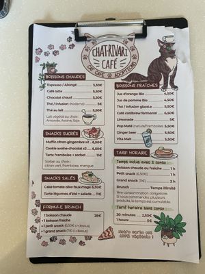   at Chat-Rivari Café in Paris