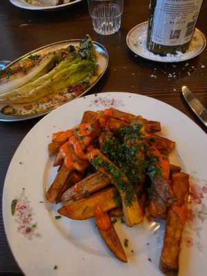 Fired potatoes and grilled romaine at Marumba in Budapest