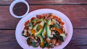 Side of black beans(they don't use meat broth or lard!), raw spinach, home fries, and avocado. at Food Bash in Winchester