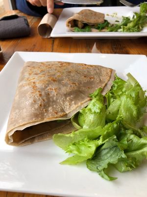 Filled with fall veggies like butternut squash and Brussel sprouts. So good! at Starving Artist Creperie and Cafe in Lee