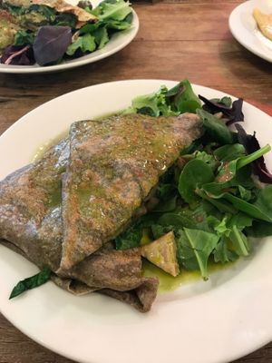 The Herbivore: vegan buckwheat crepe with tempeh, mushrooms, and caramelized onions served over salad.  at Starving Artist Creperie and Cafe in Lee