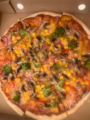 Thick crust pizza with vegan cheese at Woodstone Pizza & Flamegrill Keswick in England