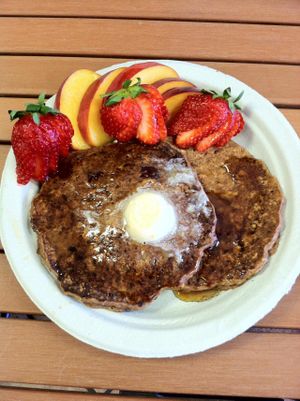 Vegan, whole grain oatmeal pancakes. These are the Cranberry Maple Pecan oatmeal pancakes! With organic grade B maple syrup and vegan olive oil butter and fresh seasonal fruit for less than $5! If you want them gluten free they will do that too at Iss' Magic Mixes Oatmeal Cafe in Mesa