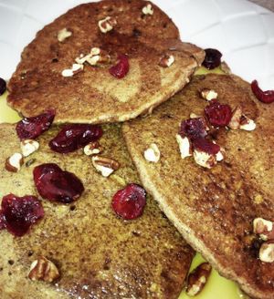 Cranberry Maple Pecan Pancakes. All Vegan, made with sprouted whole grains and Iss' Magic Mixes Oatmeals. Served with a side of fresh seasonal fruit at Iss' Magic Mixes Oatmeal Cafe in Mesa