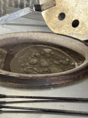 Bread being made fresh in front of you  at Baghdad in London
