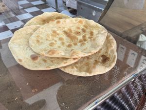 Fresh bread just out of the tandoor ovenn  at Baghdad in London