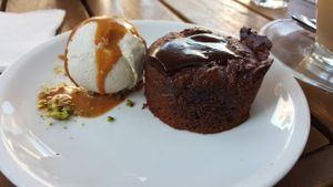 Warm chocolate cake with ice cream in hazlenut butter at Anastasia in Tel Aviv