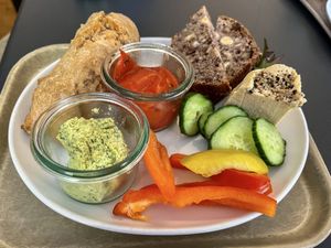 Small hearty breakfast with spelt bun, hazelnut bread, cashew cheese and vegetable spread  at Das Voglhaus in Konstanz