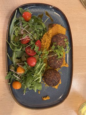 Buckwheat “meatballs” with pumpkin hummus and salad   at Zielony Talerzyk in Lublin