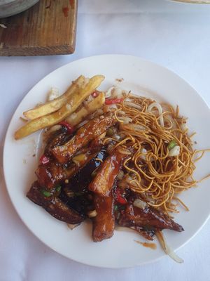 Aubergine in chilli & black bean sauce, noodle, s&p chips at Peking Garden Wilmslow in England