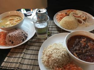 Escoveitch tofu with rice (top), yam stew with peas & rice (left), barbeque veggie mince with rice (bottom) at Fi Real in Bristol