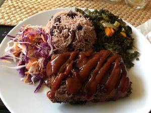 Jerk tofu, rice and peas, kale & coleslaw.  at Fi Real in Bristol
