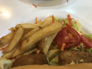 Fries and fresh salad   at Konu Bar in Buenos Aires