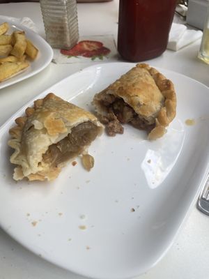 Half empanada de cebolla, half empanada „vegan minced meat"  at Konu Bar in Buenos Aires