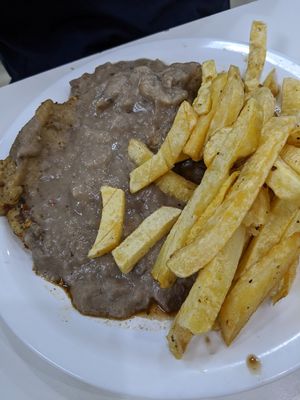 Matambre con salsa de champiñones. We didn't like it. at Konu Bar in Buenos Aires