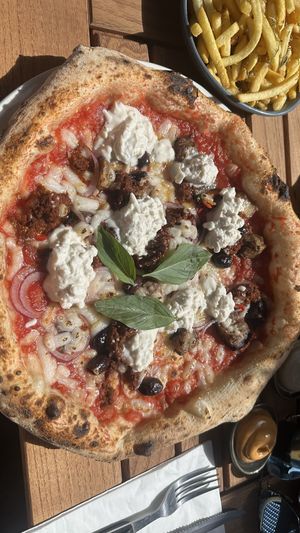 Pizza with added vegan burrata   at Fatto a Mano Covent Garden in London