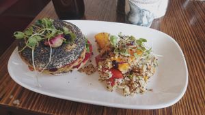 Vegan corn fritter bagel with salad at Dad and Dave's Cafe in Yarraville