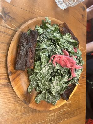 BBQ Tempeh Kale Caesar 8/10 needs a crunchy bit. Slivered almonds, chickpea or crouton?   at P.S. and Co. in Philadelphia