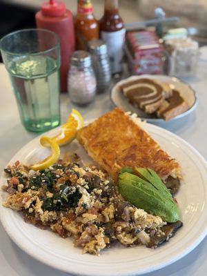 Tofu scramble, hashbrowns, and rye toastt  at The Daily Feast PDX  in Portland
