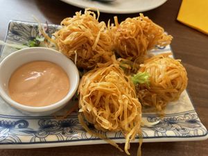 Cheezy melty balls  at Lotus Plant Based Kitchen in Manchester